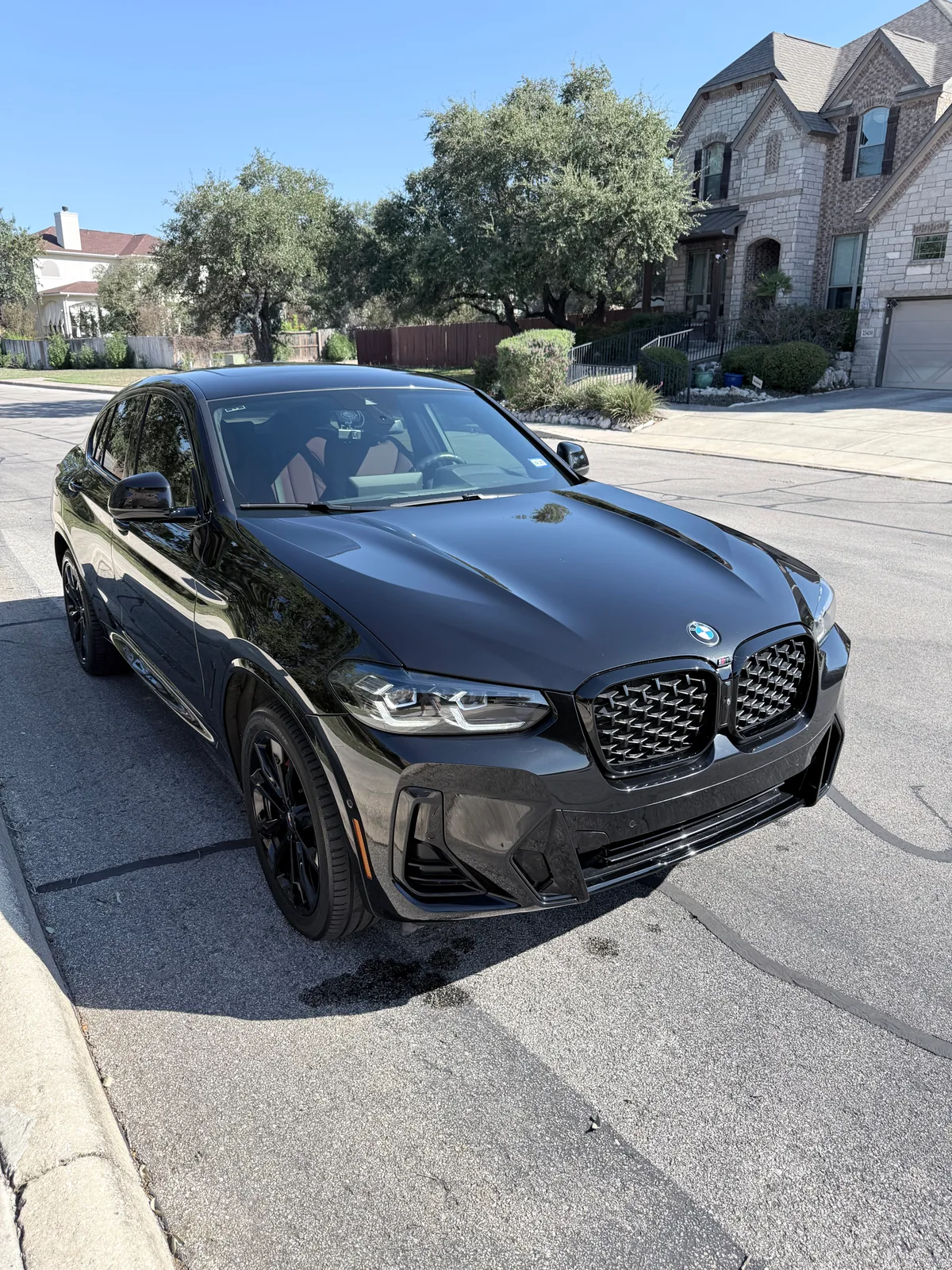 Black BMW X4 M after an exterior detail and wax by Spade Detail Co.