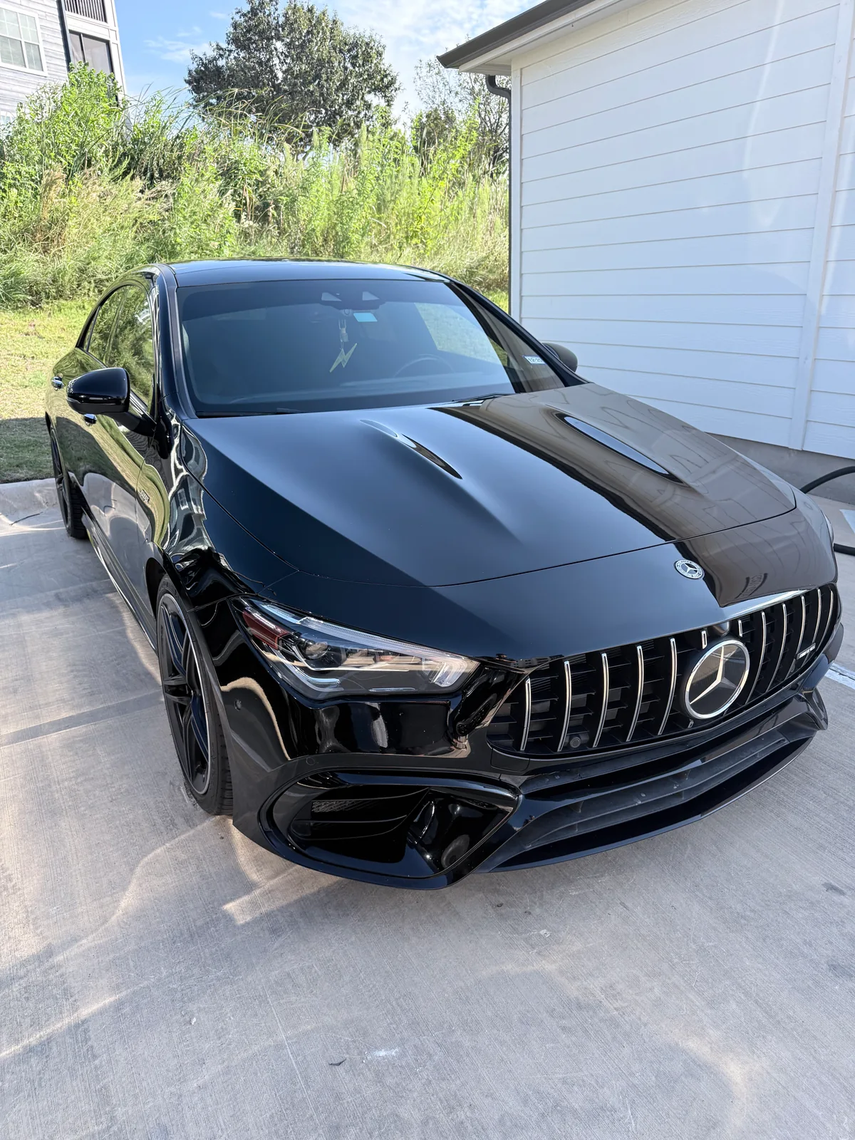Black Mercedes-AMG CLA 45 after a full detail and wax by Spade Detail Co.