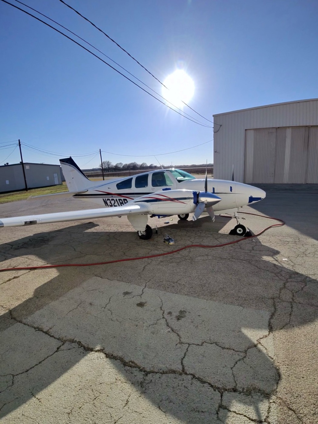 Aircraft exterior detail work on a ramp in Central Texas
