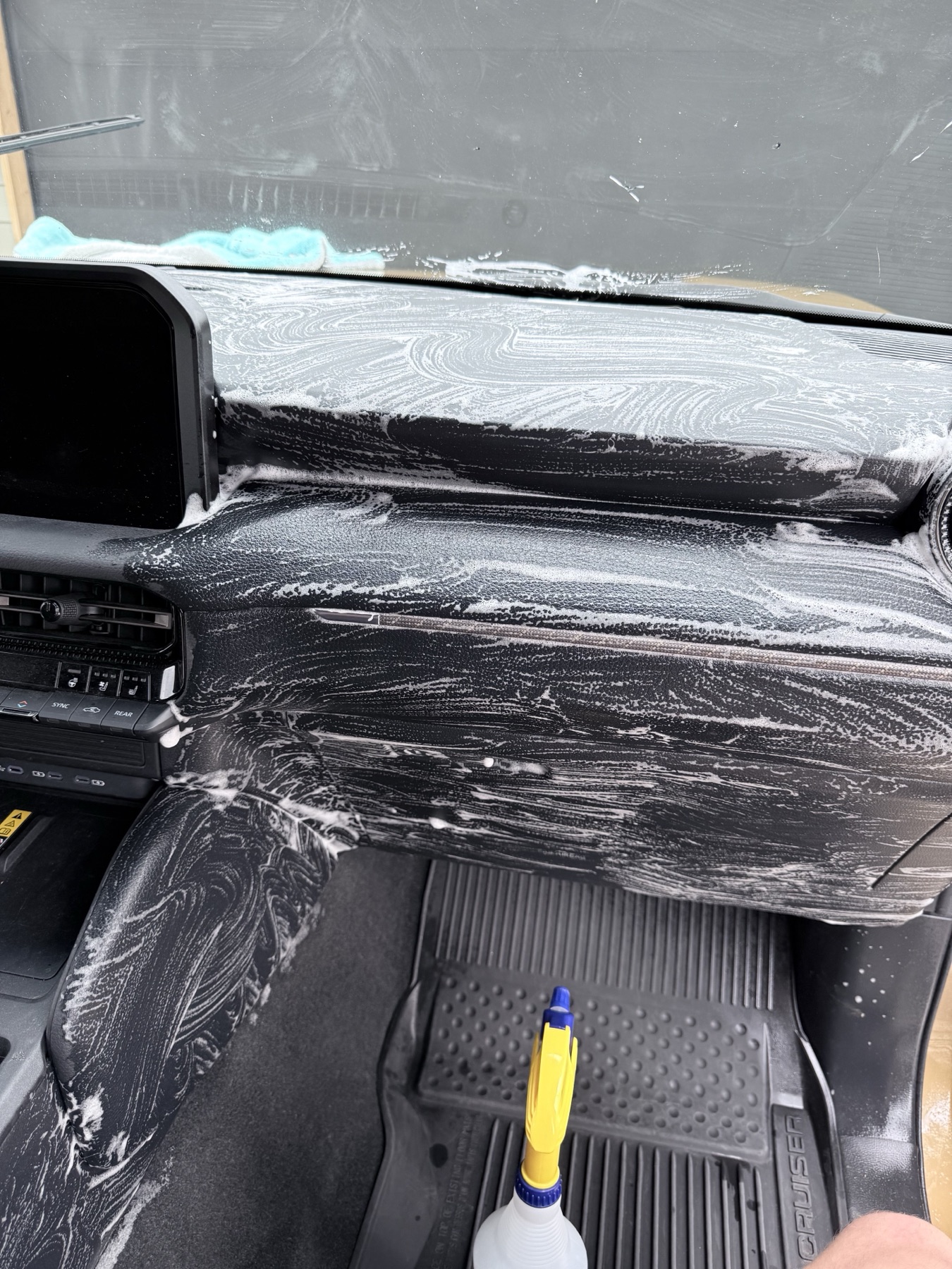 Toyota Land Cruiser dashboard deep cleaning process by Spade Detail Co