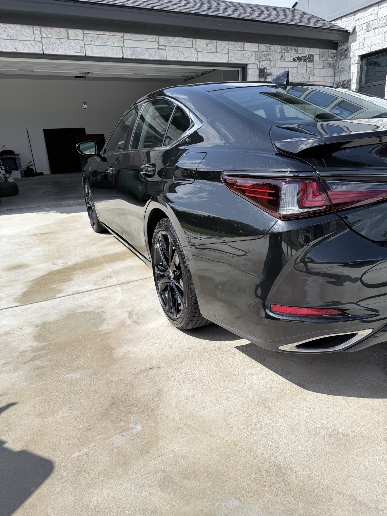 Black Lexus ES rear quarter after premium detail