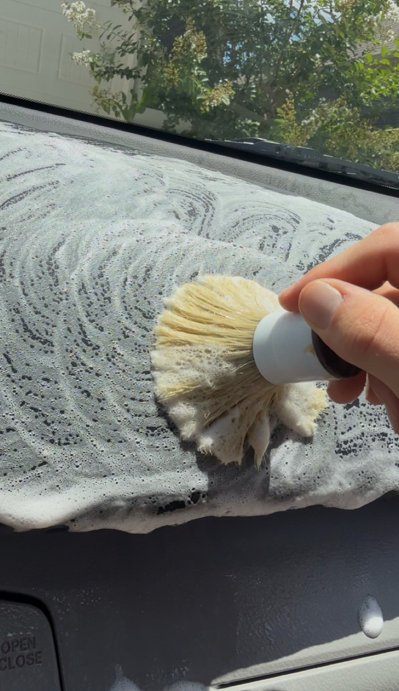 Mazda CX-9 dashboard deep cleaning during an interior detail near San Marcos TX