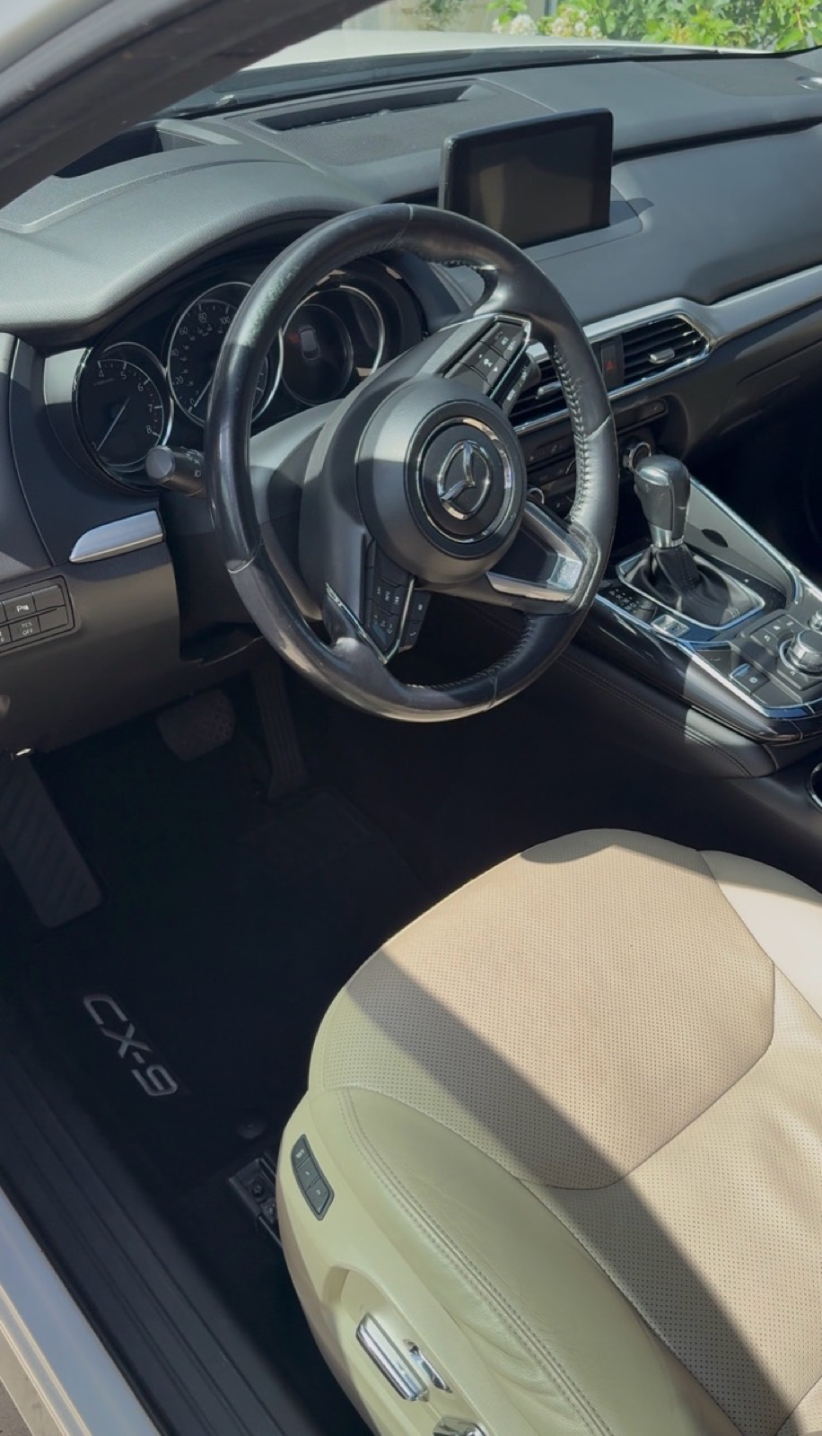 Clean Mazda CX-9 driver area after premium interior detailing in Central Texas
