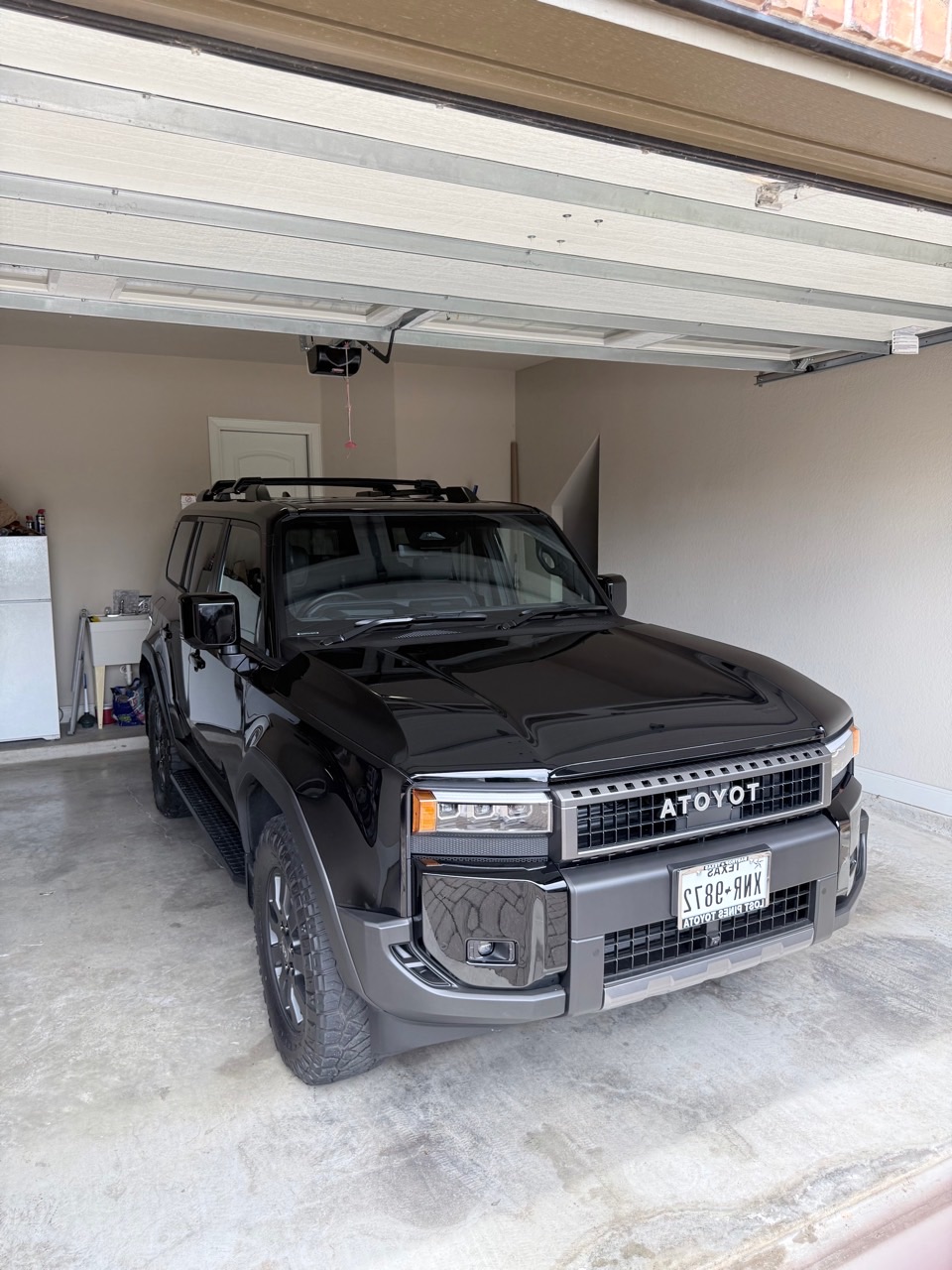 Finished black Toyota Land Cruiser after premium detailing by Spade Detail Co near San Marcos TX